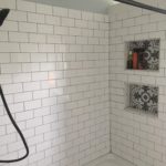 shower remodel subway tile shelf